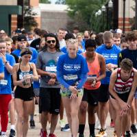 Start of race with all participants under arch